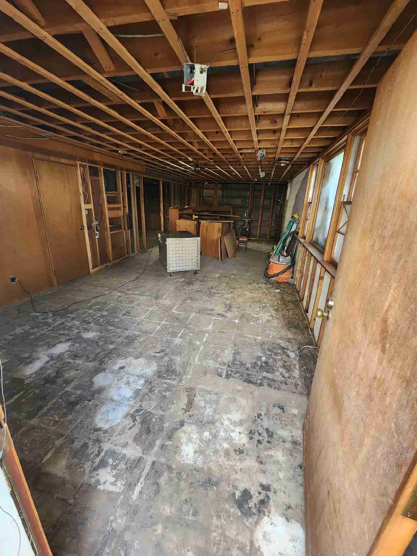 D0DCD555-0ACA-4EEB-980C-1C16AF6F9FAD_Original Unfinished basement with exposed ceiling and concrete floor.